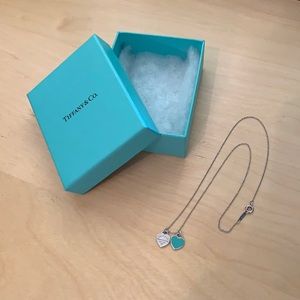 Tiffany & Co. Double Heart Tag Pendant.